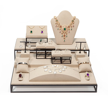 Beige suede jewelry display stand